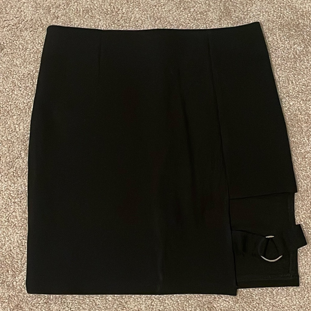 Black mini body con skirt with cutout
